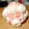 cream peonies and pink roses wedding bouquet
