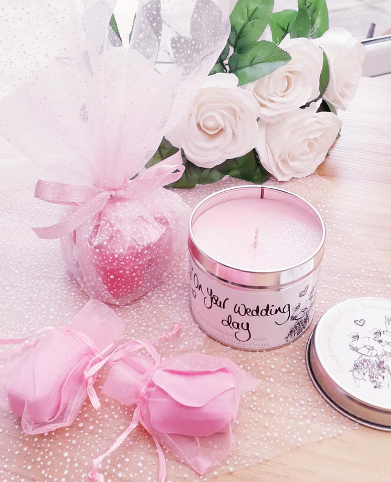 pink candle and favours