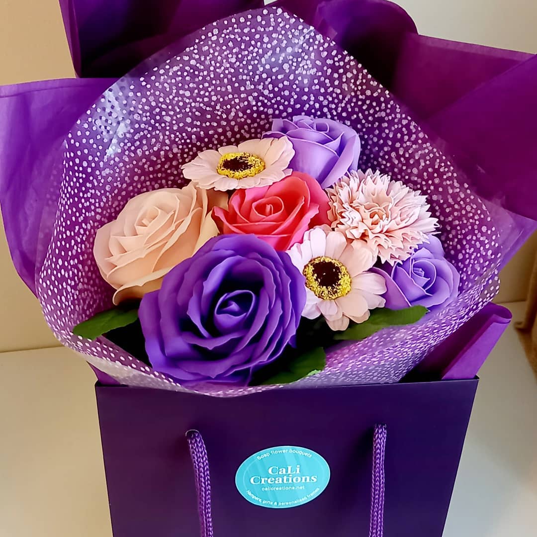 close up pink and purple flower bag