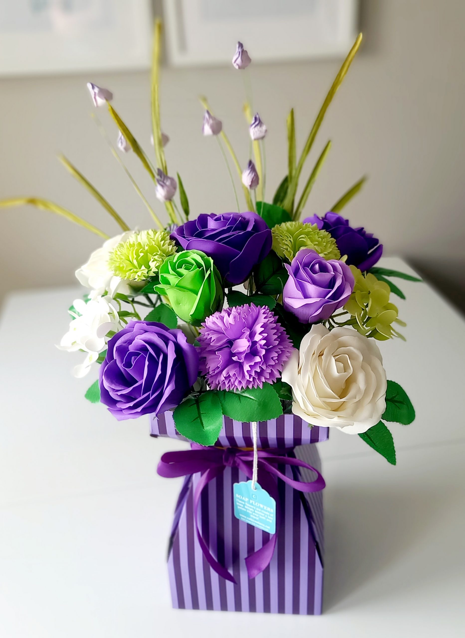 greens and purple transporter vase
