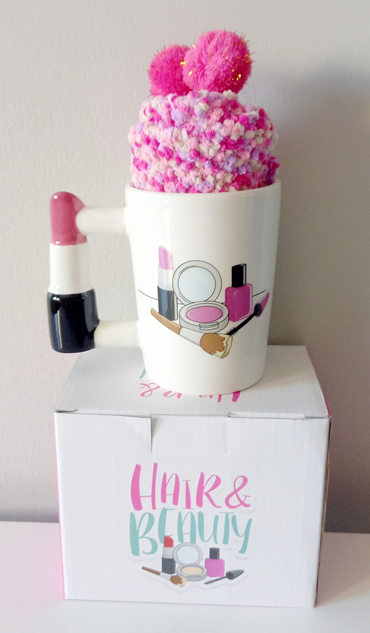 pink cosy socks and lipstick cup