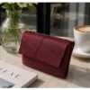 medium pebbled purse with gift box in wine